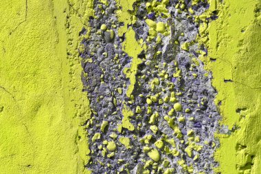 Kaba düzensiz beton yüzeyine kısmen sarı boyalı. Özgün tasarım arka plan.