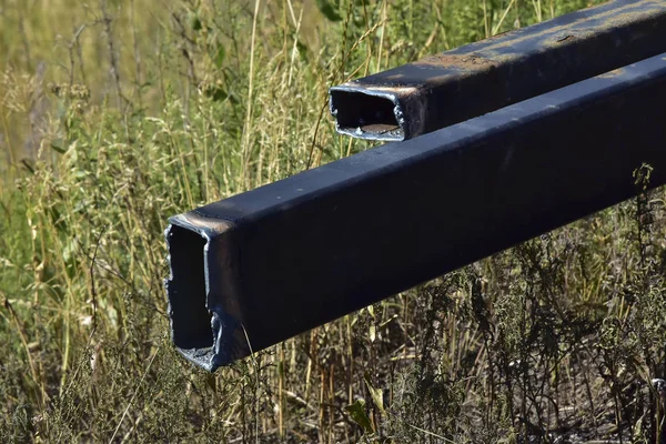 metal structures after gas cutting. melted metal on rusty profile pipes