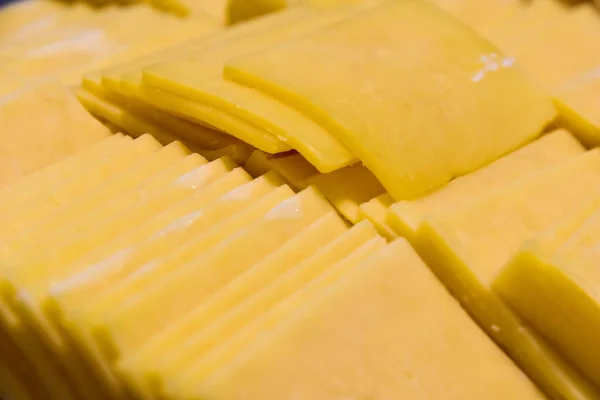 Cheddar peynir dilimleri kapatın. Gıda uygunluğunu