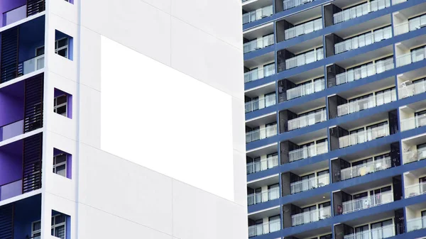 Place for mock up banner on the facade of a modern high-rise building — Stock Photo, Image