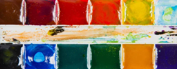 A set of children's paints in rectangular forms close-up — Stock Photo, Image