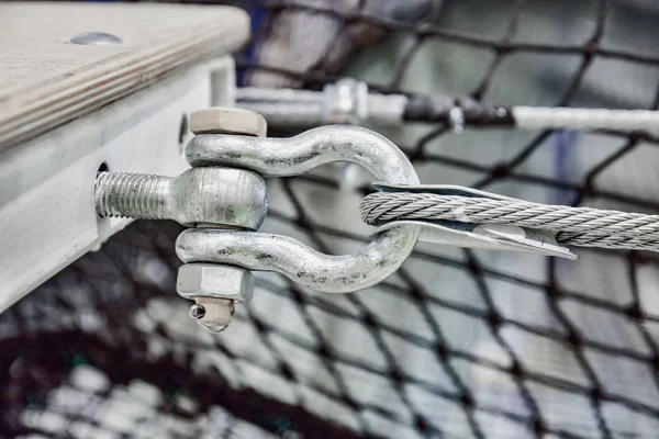 Fastening of a steel cable to a metal construction close up — Stock Photo, Image