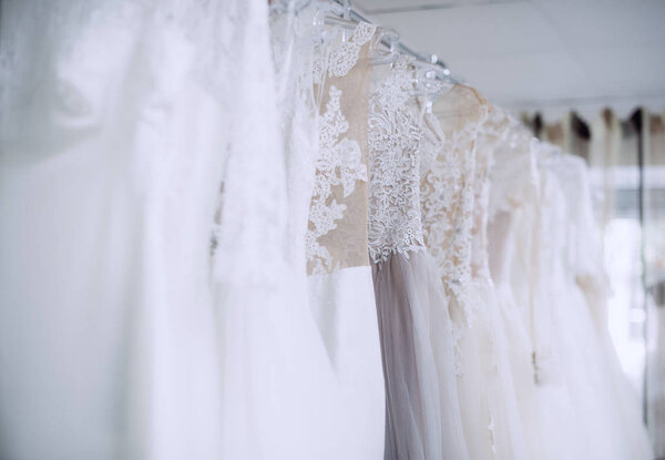 Collection of wedding dresses in the shop