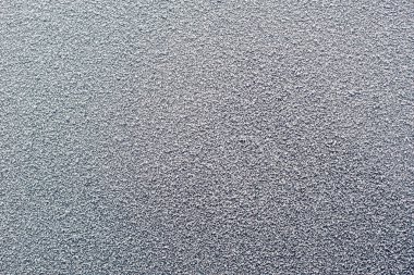 Donmuş doku. Kar üstünde belgili tanımlık pencere