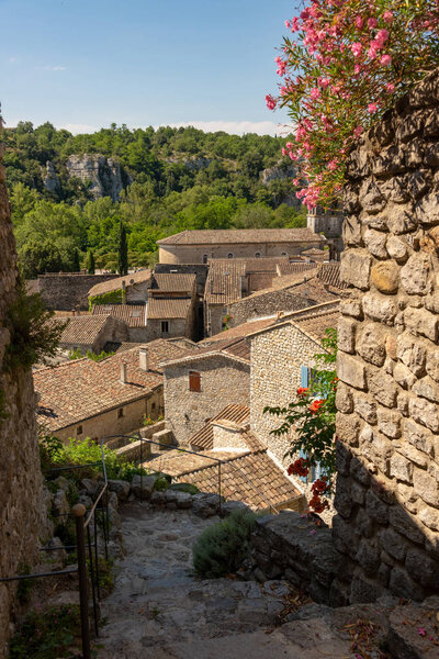 View between the houses to the roofs of the old French village Labeaume at the Ardeche in France
