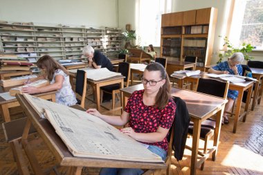 The reading room of Vernadskyi National library of Ukraine in Kiev, Ukraine. October 14, 2015. clipart