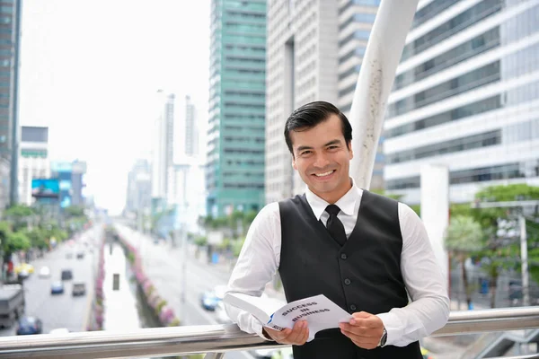 Business concept. Businessman is reading a book. Business people are studying for business.