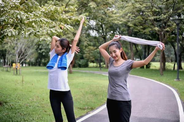 Exercise concept. beautiful girl is exercising in the park. Beau