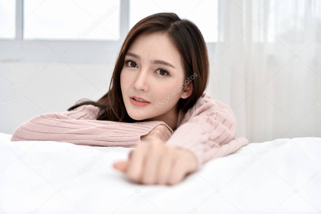 Relaxation concept. The beautiful girl is smiling happily inside