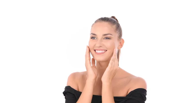 Conceito de beleza. A mulher está massageando seu rosto feliz . — Fotografia de Stock