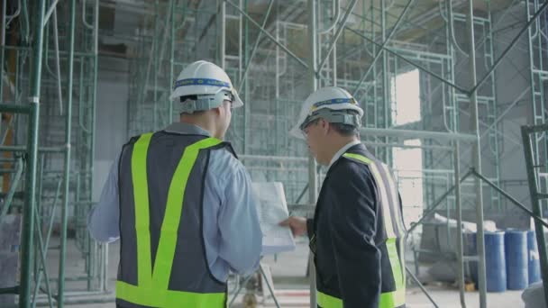 Koncepcja Inżyniera Biznesmeni Planują Prace Budowlane Budynku Rozdzielczość — Wideo stockowe