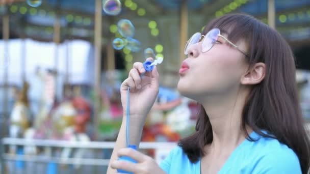Tourism Concept Girl Blowing Bubbles Amusement Park Resolution — Stock Video