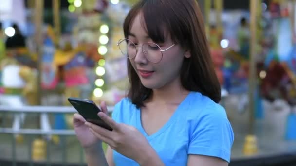 Tourism Concept Girl Taking Pictures Amusement Park Using Mobile Phone — Stock Video