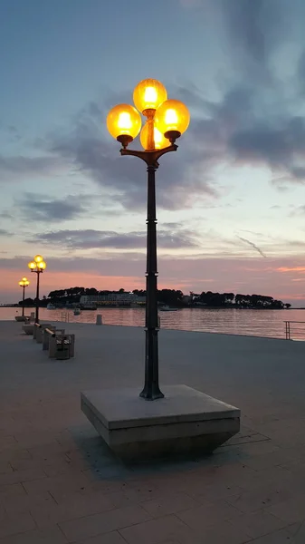 Three Old Baroque Style Street Lamps Bright Yellow Light Sea — Stock Photo, Image