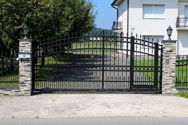 Massive Black Wrought Iron Entrance Doors Decorations Held Place Two — Stock Photo, Image