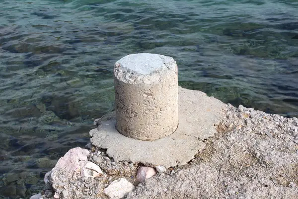 Stone Mooring Bollard Edge Concrete Pier Next Clear Sea Cold — Stock Photo, Image