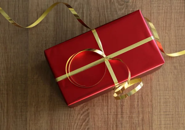red gift box with ribbons
