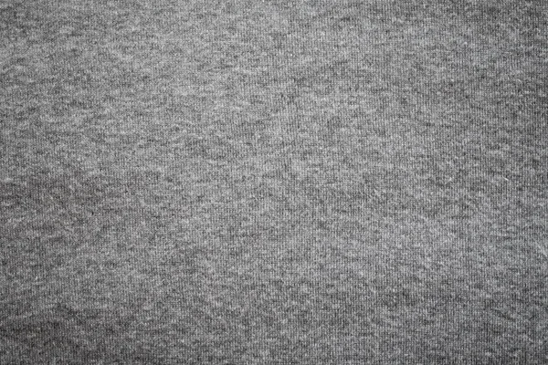 Grey background. abstract texture of fleecy knitted fabric. — Stock Photo, Image