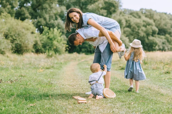 Happy Family Two Kids Spending Time Summer Feild Father Piggybacking — Stock Photo, Image