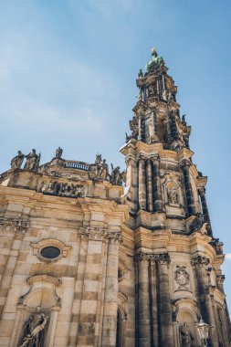low angle view of beautiful Dresden Cathedral or Cathedral of the Holy Trinity against blue sky, Dresden, Germany  clipart