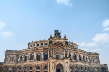 low angle view of beautiful architecture of Semperoper opera house in Dresden, Germany clipart