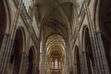 PRAGUE, CZECH REPUBLIC - JULY 23, 2018: beautiful stained glass windows inside st vitus cathedral in prague, czech republic  clipart