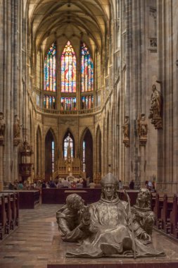 PRAGUE, CZECH REPUBLIC - JULY 23, 2018: people and sculptures inside st vitus cathedral in prague, czech republic clipart