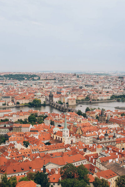 aerial view of beautiful prague cityscape with famous Charles Bridge and Vltava river