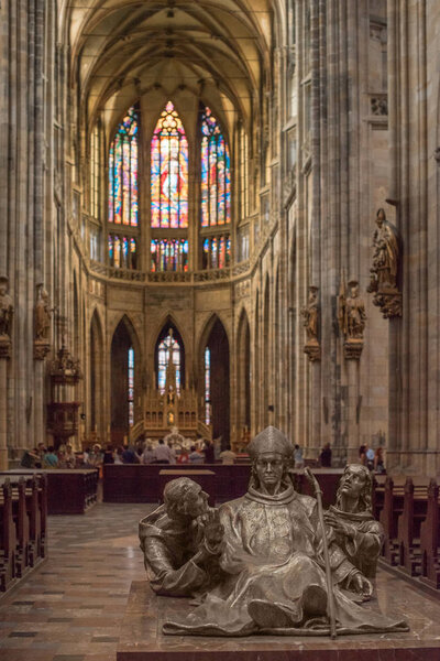 PRAGUE, CZECH REPUBLIC - JULY 23, 2018: people and sculptures inside st vitus cathedral in prague, czech republic