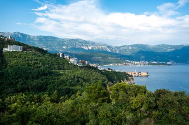 beautiful view of adriatic sea and forest in Budva, Montenegro clipart