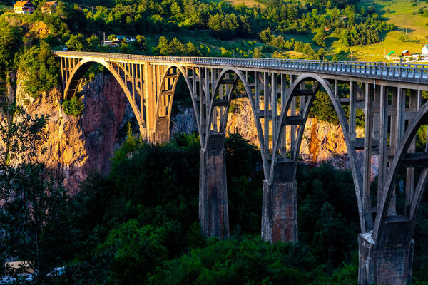 beautiful Tara Bridge during sunset in Montenegro