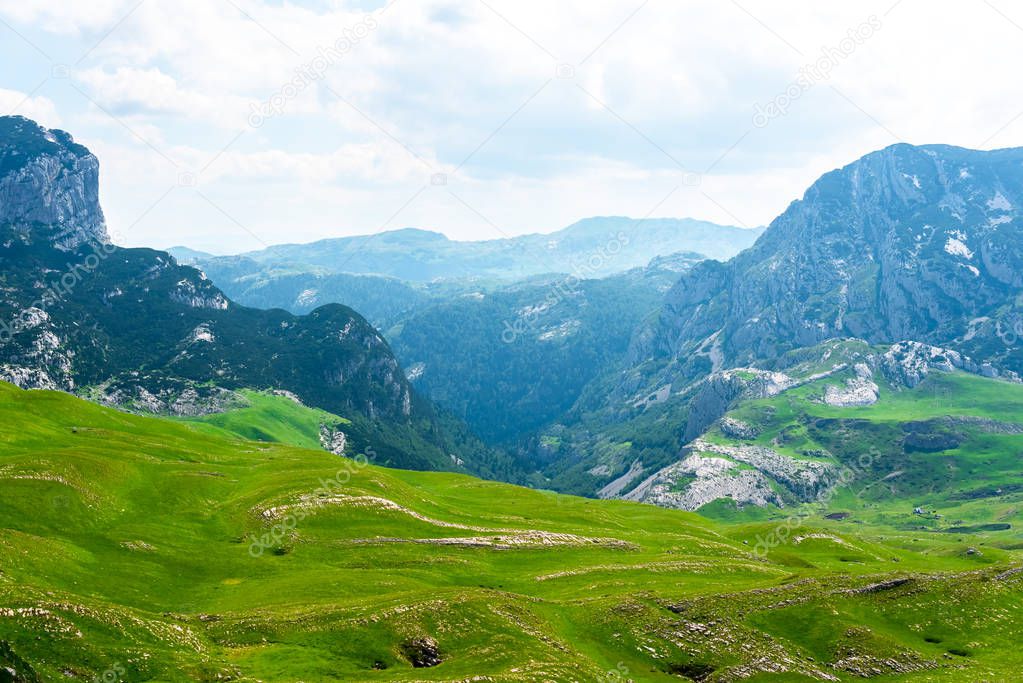 beautiful green valley and mountains in Durmitor massif, Montenegro 