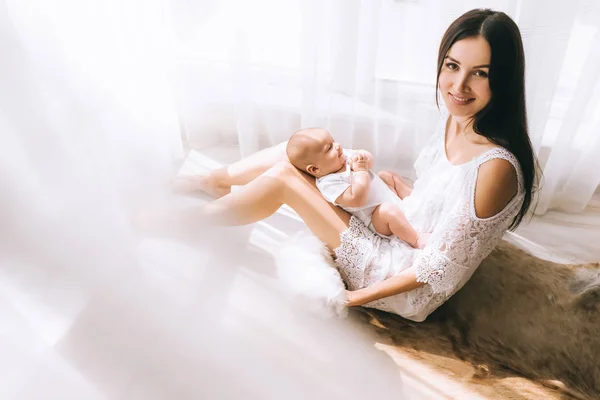 Happy Young Mother Playing Infant While Sitting Floor Home Bichon — Stock Photo, Image