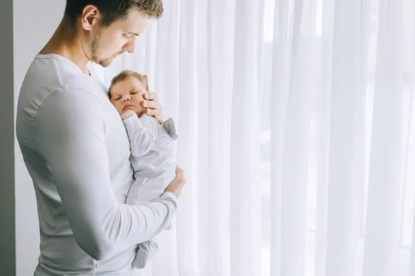 Side View Handsome Man Carrying Little Baby Boy Front Curtains — Stock Photo, Image