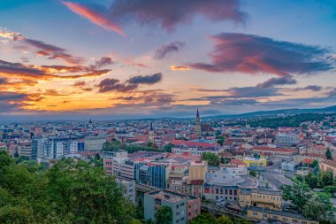 Cluj city overview at sunrise from Cetatuia Hill in Cluj-Napoca, clipart