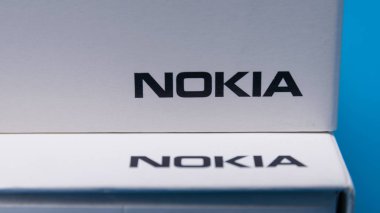Cluj, Romania - May 13, 2019: Nokia logo on a smartphone box mad clipart