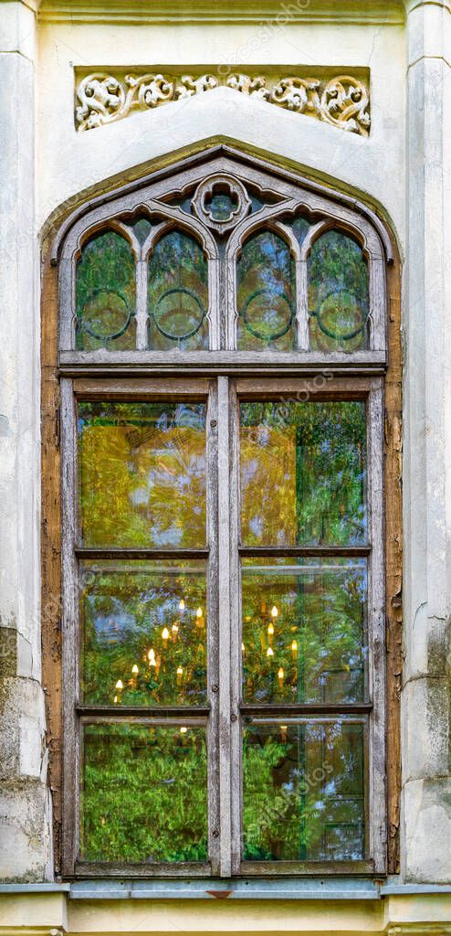 An old beautiful window in Bucharest, Romania. Old and historic 