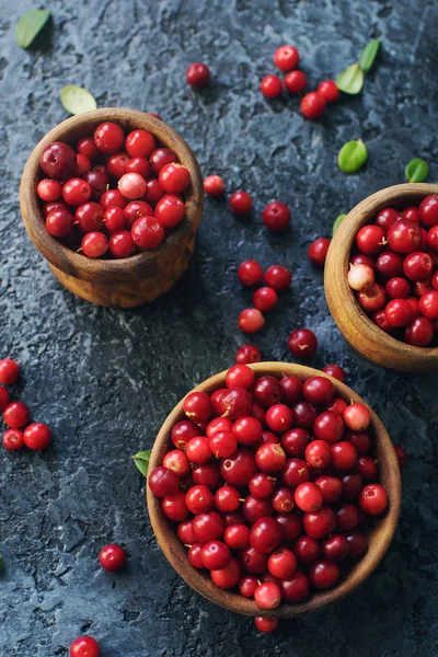 Raw Organic Fresh Cowberry Lingonberry Wooden Bowls Dark Stone Table — Stock Photo, Image