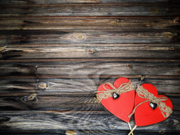 greeting card love valentine's day with hearts on vintage wooden background and copy space