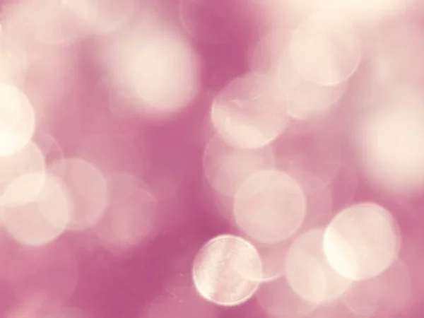 抽象的なピンクの背景ぼかしキリストライトガーランドボケバレンタインデー — ストック写真