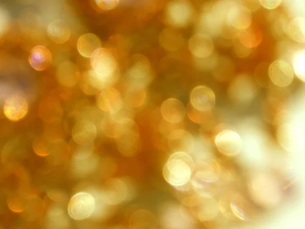 Soyut altın bulanıklık arka plan parlak bokeh — Stok fotoğraf