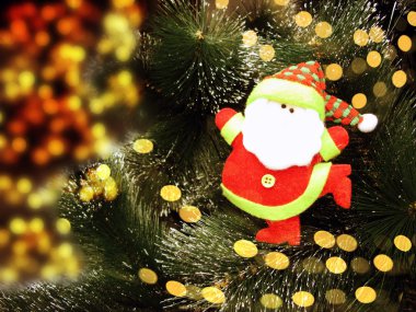 Noel ağacı ve çelenk ışıkları ile Santa arka plan