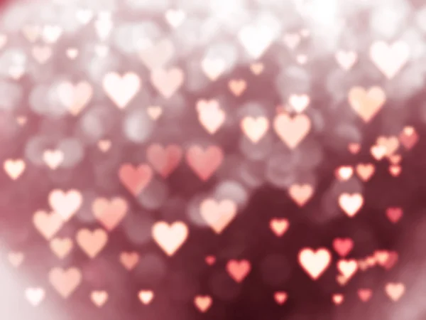 Love abstract background shiny hearts colorful blurs — стоковое фото