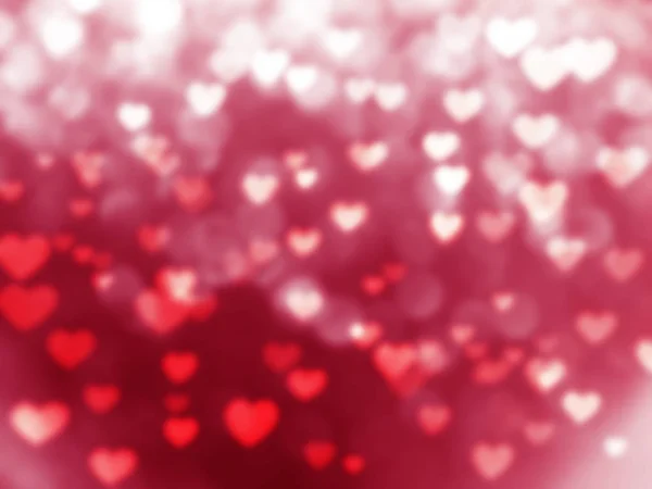 Rozmywa miłości streszczenie tło błyszczące kolorowe serca — Zdjęcie stockowe