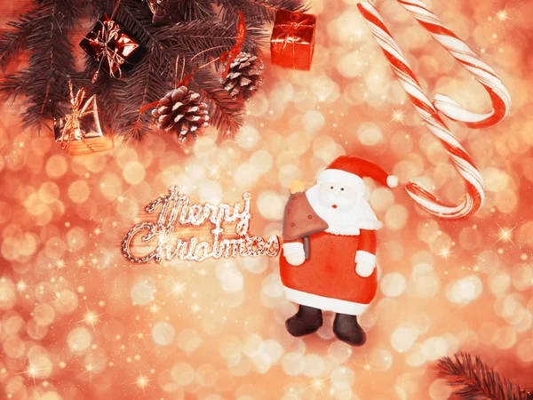 Natal santa decoração no fundo brilhante com guirlanda ligh — Fotografia de Stock