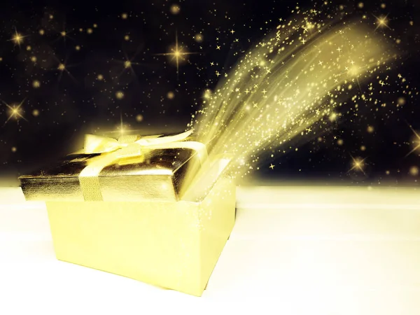 Oro presente caja abstracta difuminaciones fondo brillante bokeh — Foto de Stock