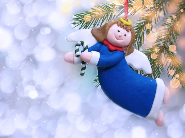 çelenk ligh ile parlak arka plan üzerinde noel melek dekorasyon