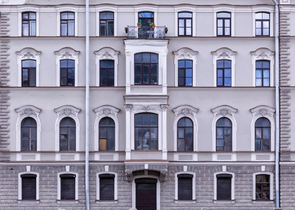 Vintage architecture classical facade residential building with bay window. Front view
