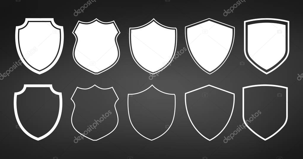Set of flat shields with contours. Vector illustration isolated on black