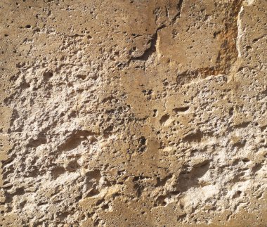 çukurlar ile sarı bir taş dokusuna